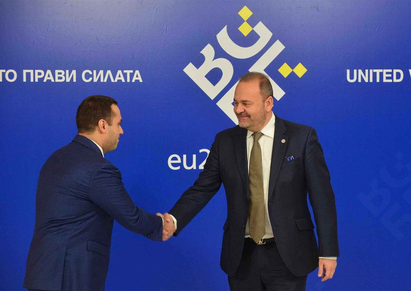 Business partners shaking hands